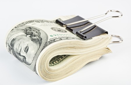 10 thousand US dollars Bundle fasten with paper clip isolated  on white backgroundの写真素材