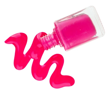 Bottle of pink nail polish with enamel drop samples, isolated on whiteの写真素材