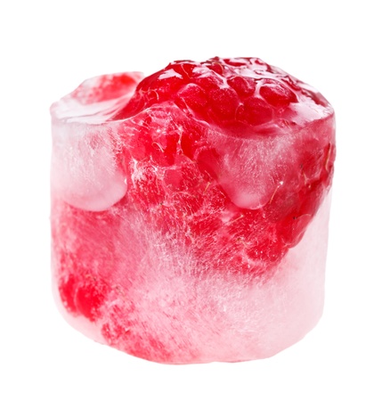 Red raspberry inside of melting ice cube, isolated on whiteの写真素材
