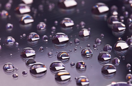 Gray abstract translucent water drops background, macro view