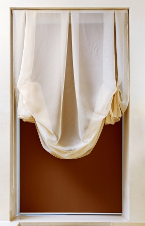 Art nouveau style curtain in window frame, interior detailの写真素材