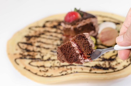 Piece of chocolate cakes with warm fudge sauce.の写真素材