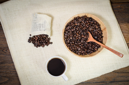 Cup of coffee on a wooden tableの写真素材
