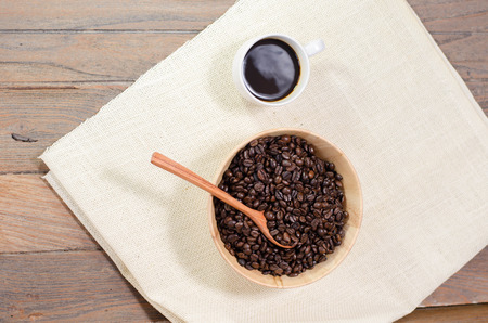 Cup of coffee on a wooden tableの写真素材