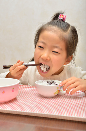 Girl eatingの写真素材