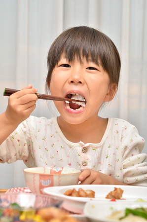 Girl eatingの写真素材