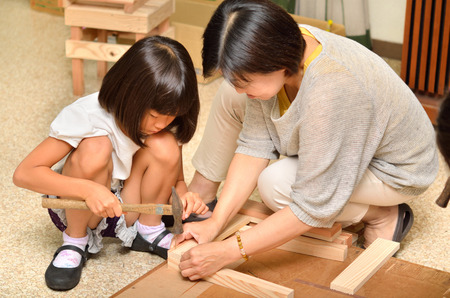 Parents and children enjoy woodworkingの写真素材
