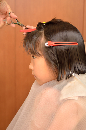 Girl haircutの写真素材