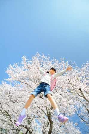School girls jumpingの写真素材
