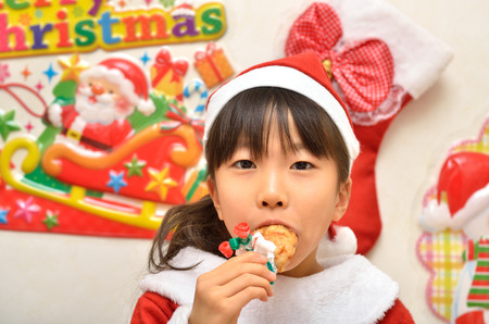 Santa Claus costume to enjoy the party girlの写真素材