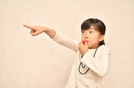 Whistling girlの写真素材