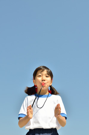 Whistling girlの写真素材