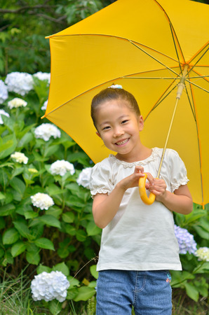 Hydrangea and elementary school girlsの写真素材