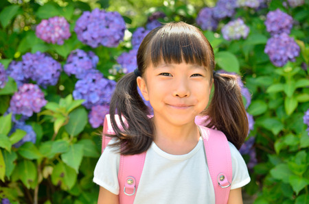 Hydrangea and elementary school girlsの写真素材
