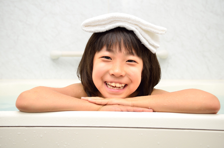 Girl take a bathの写真素材