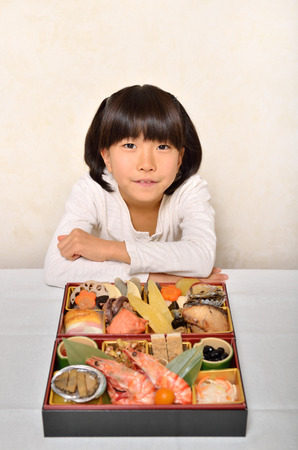 Girl enjoy japanese cuisineの写真素材