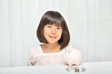 Girl save coinsの写真素材