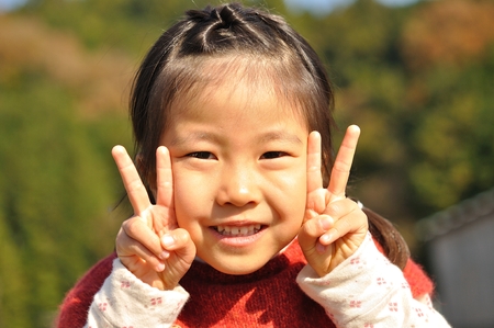 Girls fork her fingersの写真素材