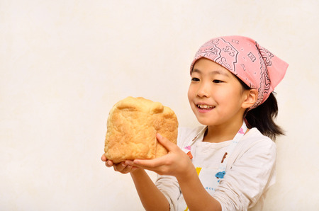 Girls bake breadの写真素材