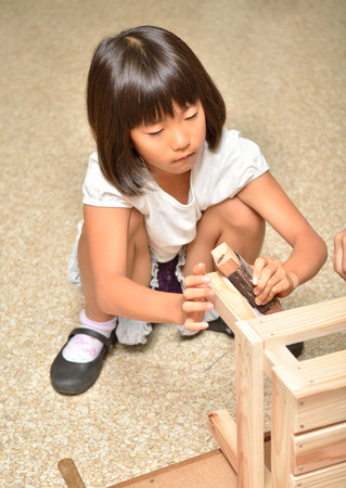 Girls enjoy woodworkingの写真素材
