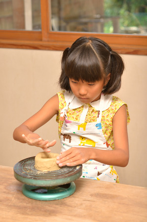 Girls enjoy potteryの写真素材