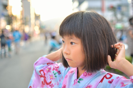 Girls enjoying the summer festivalの写真素材