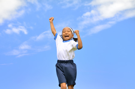 Girls strike a victory poseの写真素材