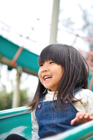 Girls playing in the parkの写真素材