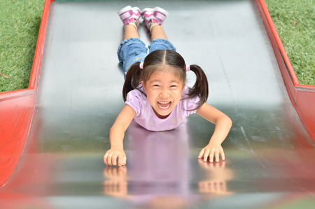 Girls playing in the parkの写真素材