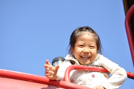 Girls playing in the parkの写真素材