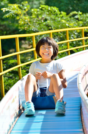 Girls playing in the parkの写真素材