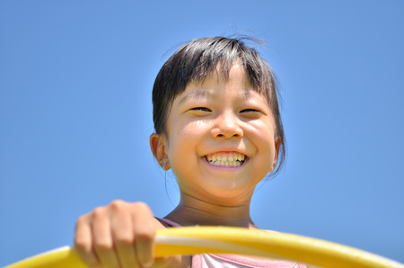 Girls playing in the parkの写真素材