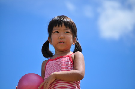 Girl's playing with ballの写真素材