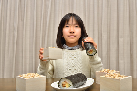 Japanese girl enjoy the day before the beginning of springの写真素材