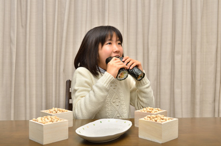 Japanese girl enjoy the day before the beginning of springの写真素材