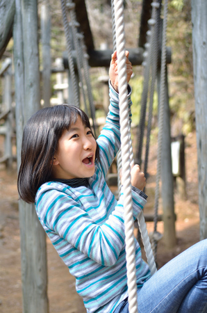 Girl's playing in the parkの写真素材