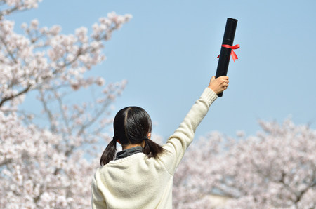 Japanese elementary school student (cherry, graduation)の写真素材