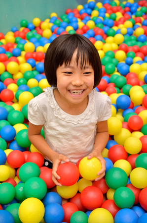 Girl's playing with ballsの写真素材