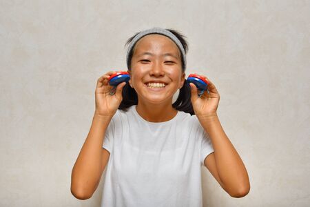 Japanese girl plays the castanet