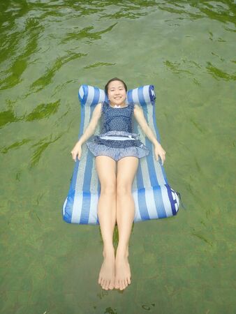 Japanese girl enjoy having the open air bathの写真素材