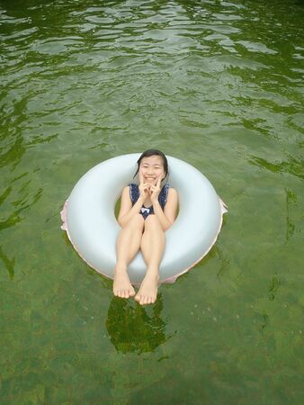 Japanese girl enjoy having the open air bathの写真素材