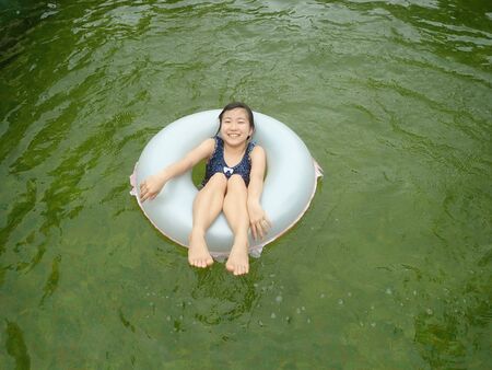 Japanese girl enjoy having the open air bathの写真素材