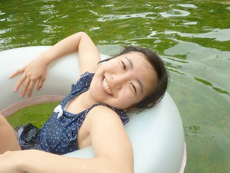 Japanese girl enjoy having the open air bathの写真素材
