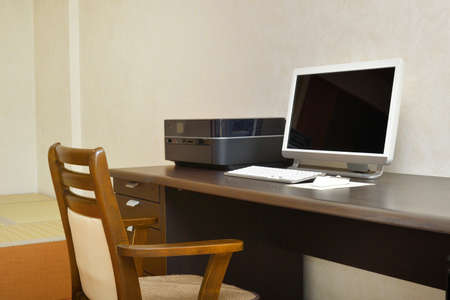 Personal computer desk and chairの写真素材