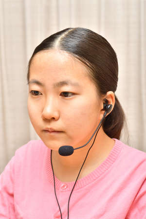 Japanese girl doing a remote workの写真素材