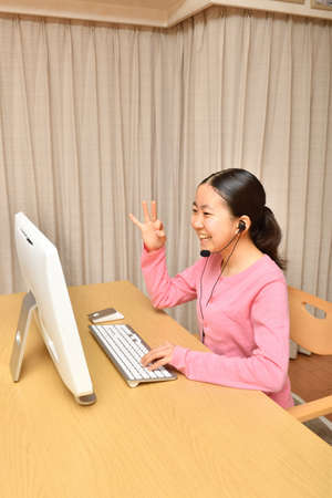 Japanese girl doing a remote workの写真素材