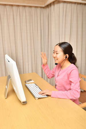 Japanese girl doing a remote workの写真素材
