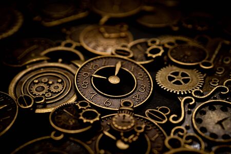 Time concept on black background, past present future clock