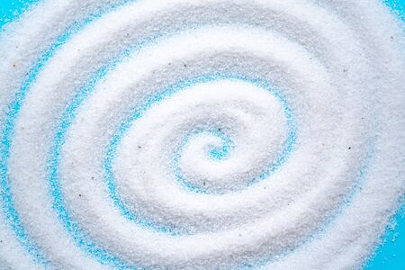 White sand pattern on blue background