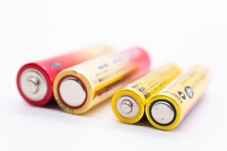 AA and AAA batteries on white backgroundの写真素材